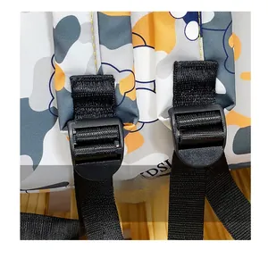 Detail of black adjustable shoulder strap buckle and weaving on camouflage school backpack