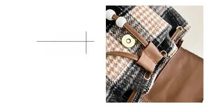 Detail display of houndstooth wool fabric bag with brown leather and gold magnetic closure