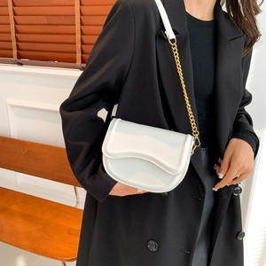 Minimalist white leather saddle bag for women with gold chain strap in modern style