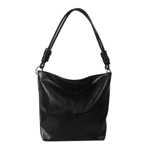 Minimalist black glossy leather tote bag with unique knotted shoulder straps for women