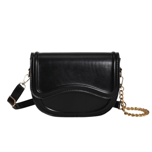 Minimalist black PU leather saddle bag with gold chain strap and curved flap design