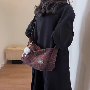 Women's plaid hobo shoulder bag in red and green vintage pattern with plush charm