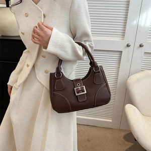 Vintage dark brown faux leather handbag with white stitching and silver buckle for women
