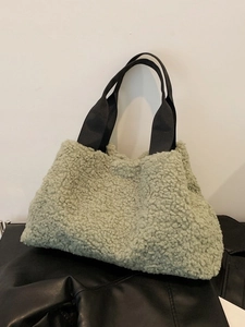 Chic green faux fur tote bag with black handles, minimalist fuzzy winter crossbody bucket bag