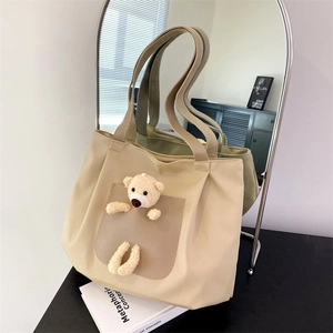 Beige nylon tote bag with 3D teddy bear plush decoration and wide shoulder straps