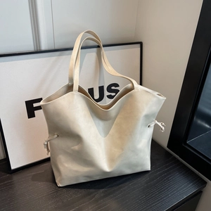 Minimalist beige PU leather tote bag with drawstring side details for women's commute