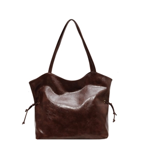 Brown vintage faux leather tote bag with large capacity and drawstring side details