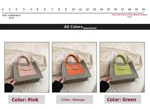 Detail view of large tote bags in grey PU leather with pink orange and green front pockets