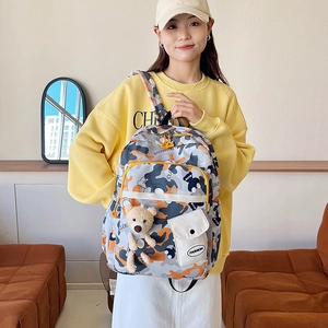 Fashionable camo student backpack with large capacity and cute bear charm in daily school style