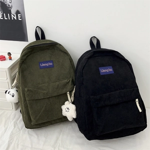 Corduroy large capacity backpacks for students in olive green and black with cute pendants