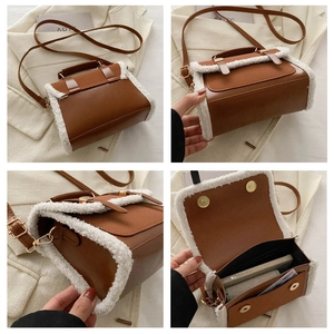 Detailweergaven van de bruine vintage PU-leren tas met witte faux-bontrand en binnenzijde