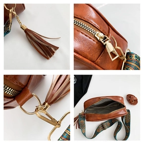 Close-up of brown PU leather crossbody bag featuring gold hardware and retro strap