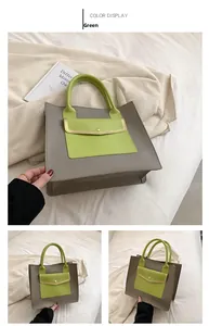 Detail view of two-tone tote bag in grey and green with mini front pocket and metal buckle