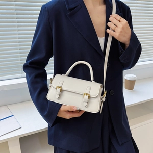 Minimalist vintage cream white shoulder bag with gold buckles and crossbody strap