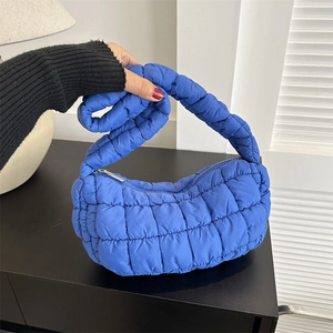 Minimalist electric blue quilted cloud shoulder bag with stylish padded handles for women