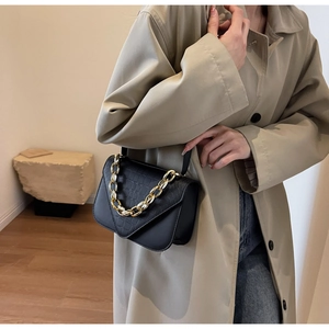 Chic black crocodile embossed square bag with decorative gold chain strap for women