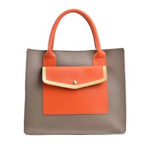 Minimalist taupe tote bag with bright orange handles and golden metal buckle decoration