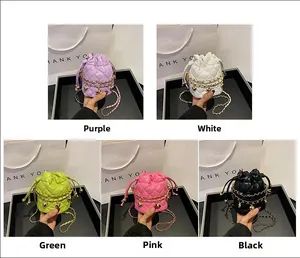 Quilted mini bucket bag with gold chain and heart pendant in five color options