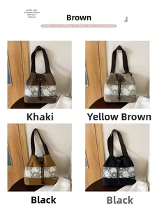 Detail view of sunflower embroidery and drawstring closure on four colorful canvas bucket bags