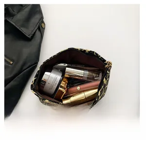 Detailed view showing the large storage capacity of this leopard print makeup pouch