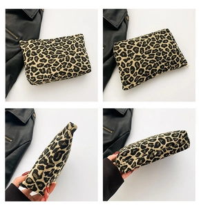 Detailed views of leopard print storage bag showing texture, zipper, and handheld size