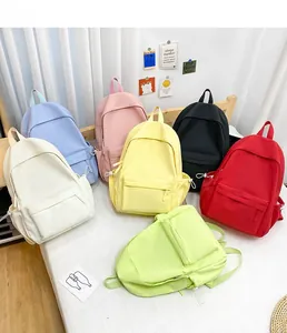Selezione di zaini scolastici minimalisti in nylon in sette colori vivaci per studenti