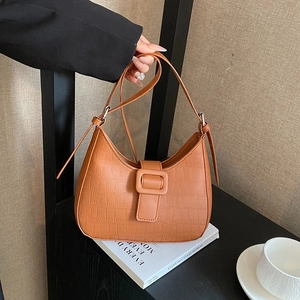 Elegant brown crocodile pattern half-moon shoulder bag with square buckle decoration