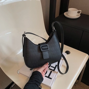 Chic black crocodile pattern half-moon shoulder bag with retro wide buckle strap