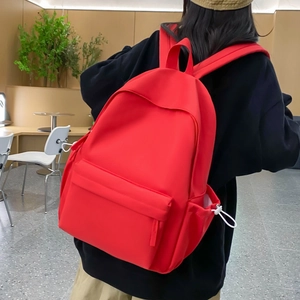 Zaino rosso minimalista ad alta capacità per studenti con tasche laterali e zip robuste