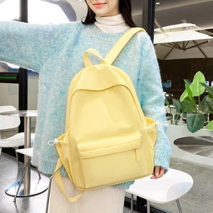 Zaino scolastico giallo minimalista di grande capacità con tasche laterali a coulisse