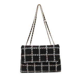 Sac à bandoulière classique en tweed bleu et noir avec chaîne dorée et motif à carreaux