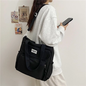 Large black canvas tote bag for students with multi-pocket fashion design for daily use