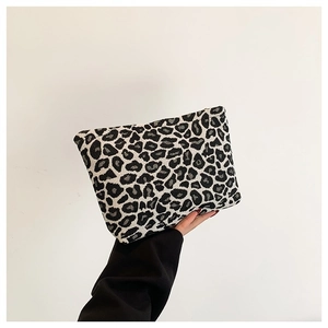 Handheld leopard print clutch bag in thick knitted tweed material for daily essentials