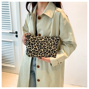 Chic leopard print clutch bag for women featuring a minimalist rectangular fabric design