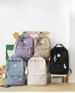 Detailed display of aesthetic nylon backpacks in purple beige blue and black colors