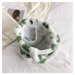 Top view of plush floral tote bag interior featuring zipper pocket and magnetic snap closure