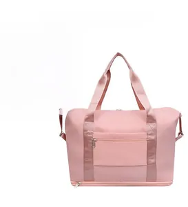 Pink large capacity travel bag featuring a trolley sleeve and separate bottom shoe compartment