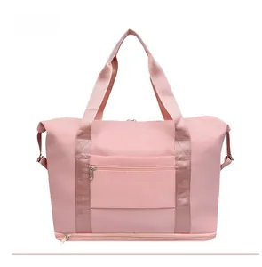 Rear view of pink large capacity travel bag with handle and back pocket design