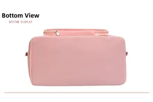 Flat view showing the wide bottom base and durable material of the pink travel bag