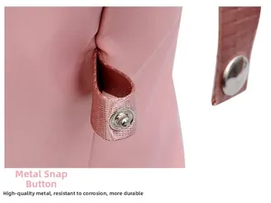 Detailed close-up of high-quality silver metal snap button on pink nylon travel bag