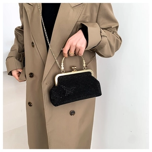 Elegant black rhinestone top-handle evening bag with heart clasp and gold chain strap