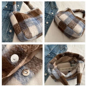 Details der blau karierten Plüschtasche mit Magnetverschluss und Innenfutter