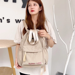 Sac à dos en nylon beige avec cordon de serrage et imprimé rouge Rabbit Love pour voyage et sport