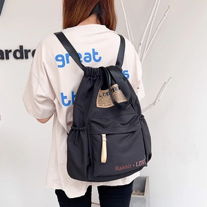 Sac à dos noir en nylon avec cordon de serrage, grande capacité pour voyage et sport