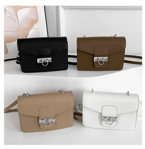 Detailed view of four small square crossbody bags in black brown khaki and white colors