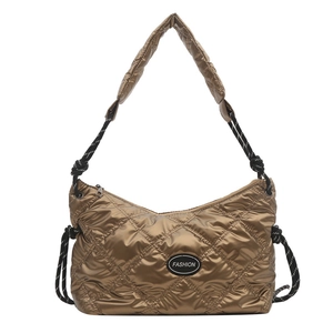 Golden quilted puffer shoulder bag with metallic finish and woven rope accent