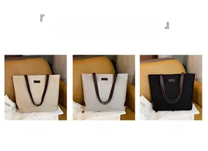 Detailed comparison of khaki, grey, and black tote bags with leather reinforced trim and base