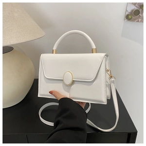 Minimalist white leather crossbody square bag with gold buckle and stylish top handle
