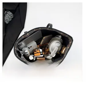 Internal view of large capacity tote bag showing space for laptop and essentials