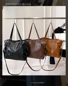 Detailed comparison of minimalist tote bags in black, dark chocolate, and caramel colors